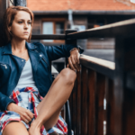 woman sitting on bench, wondering how to help someone with social anxiety