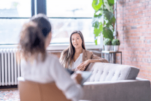 woman talking with therapist about dbt benefits