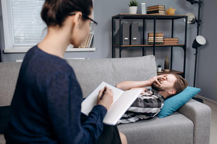 male meeting with female mental health therapist