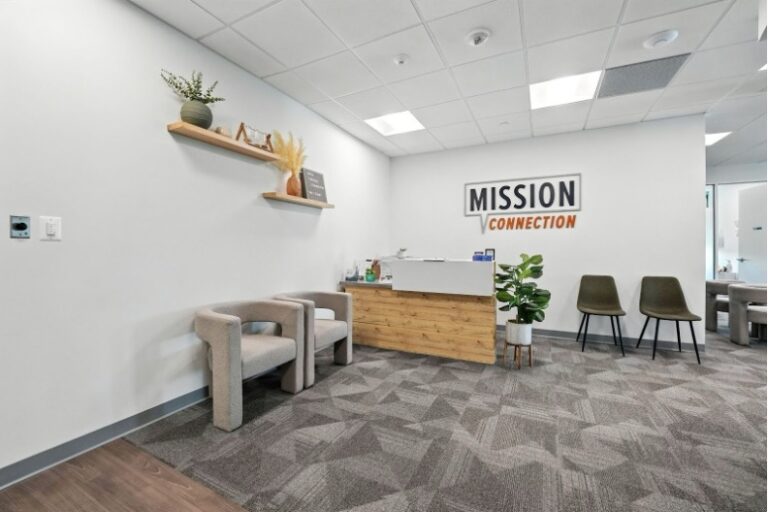 Mission Connection outpatient treatment reception area with front desk and comfortable seating