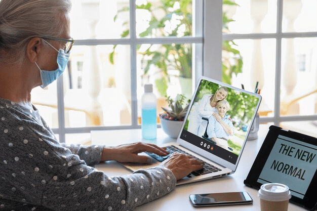 female attending a virtual therapy session from home