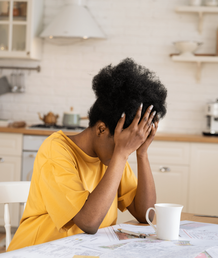 Angry woman sitting at her desk