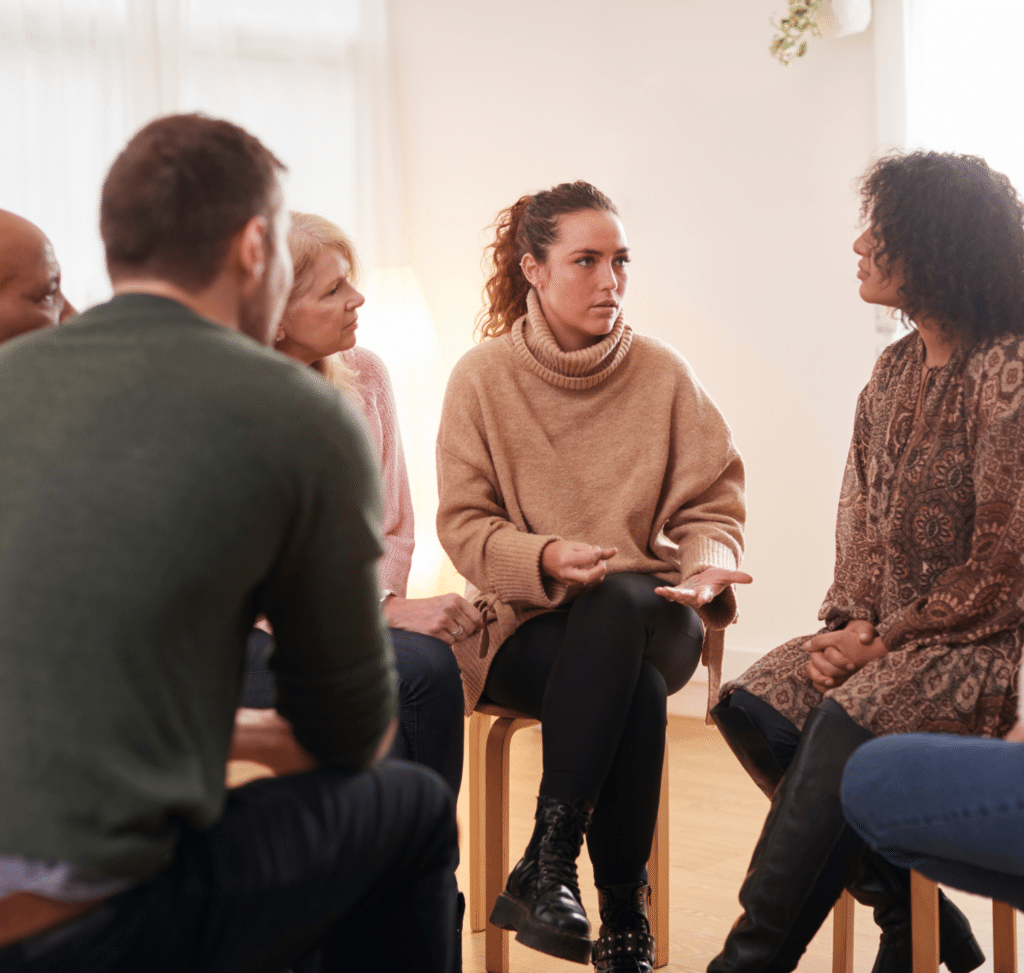 Group therapy session for adults with oppositional defiant disorder