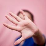 Woman fighting back against domestic abuse