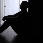 Man experiencing symptoms of depression