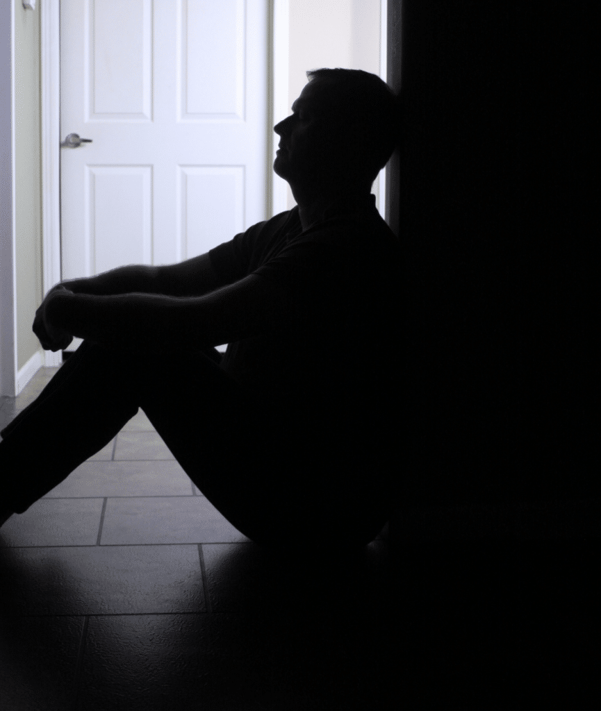 Man experiencing symptoms of depression
