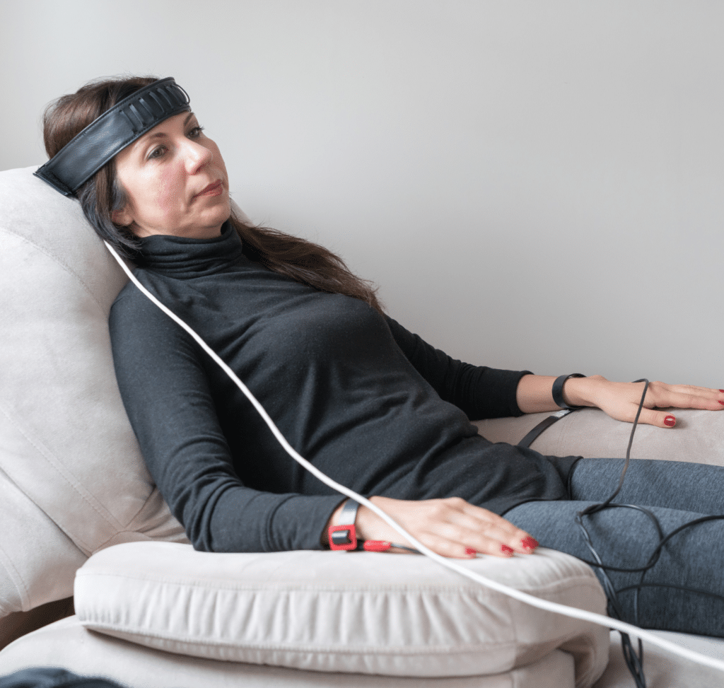 Woman receiving neurofeedback therapy
