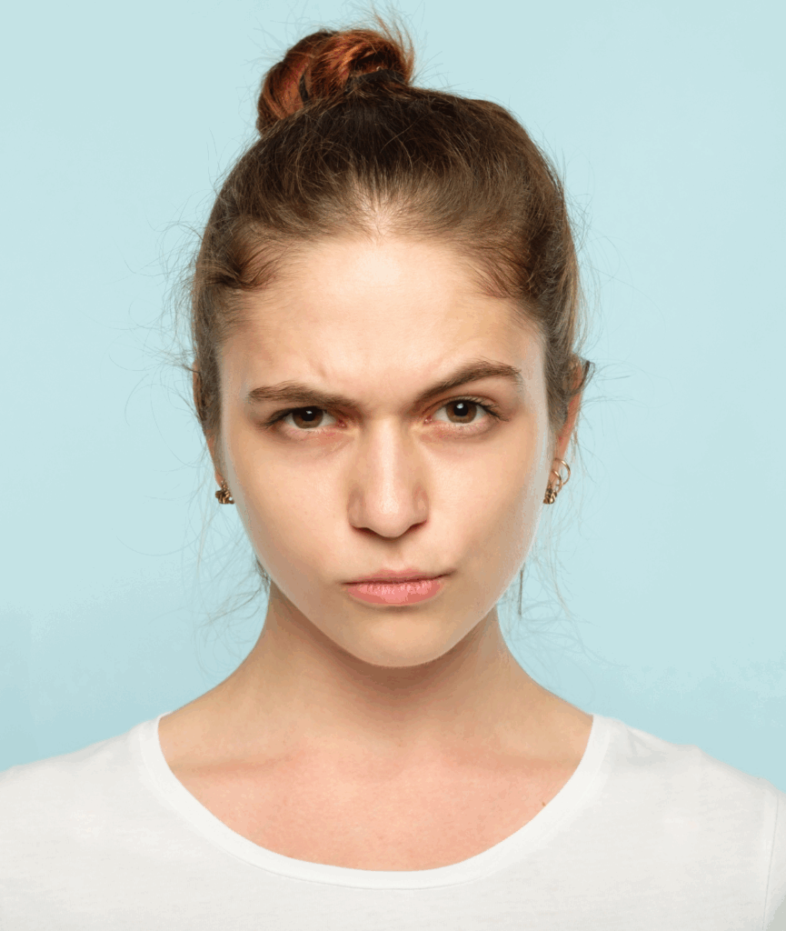 Woman with one eyebrow raised wondering what the causes of narcissistic personality disorder are