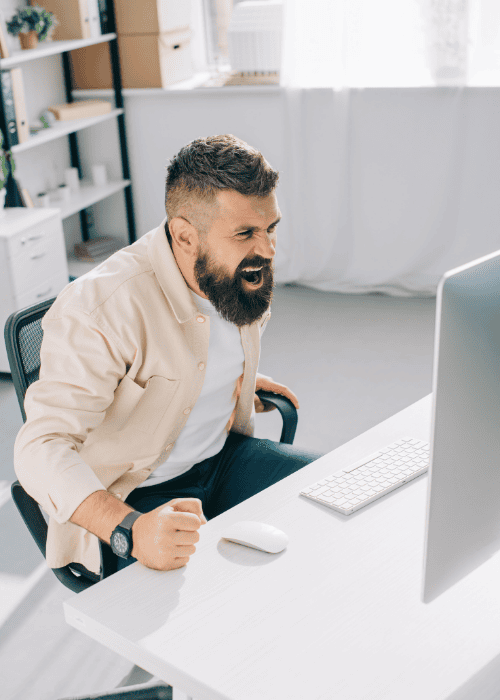 angry man shouting at his laptop due to impulsivity in adults