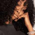 woman experiencing sudden mood shifts looking unhappy with head on hand in need of mood swings treatment