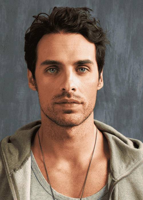 man staring blankly, experiencing difficulty expressing emotions