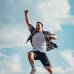 Man jumping into the air showing hypomania symptoms in adults