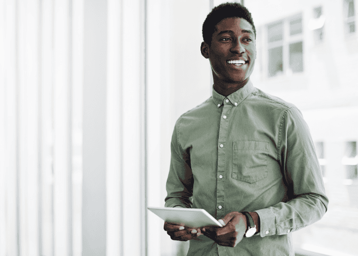 Man looking happy due to getting treatment for catastrophic thoughts in adults