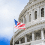 Capitol building and US flag representing mental health access challenges in rural Washington communities