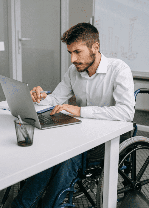 Man in a wheelchair struggling with work due to disability and mental health