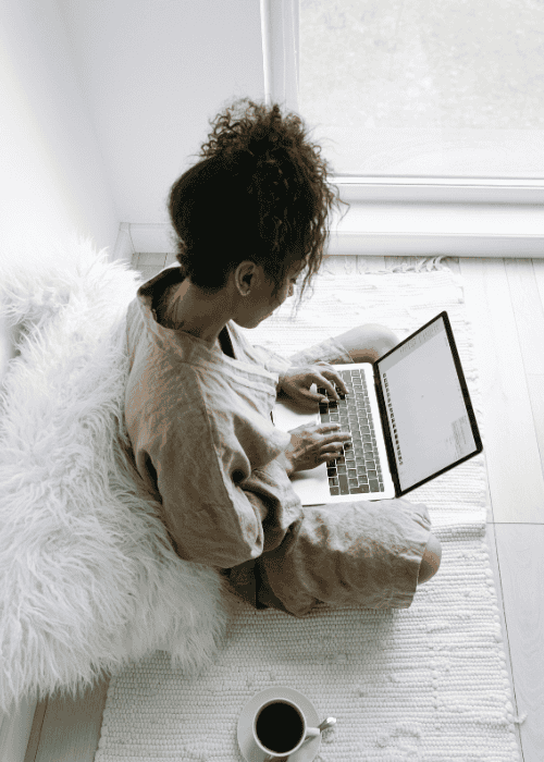 Woman accessing online therapy learning how telehealth helps rural/underserved communities