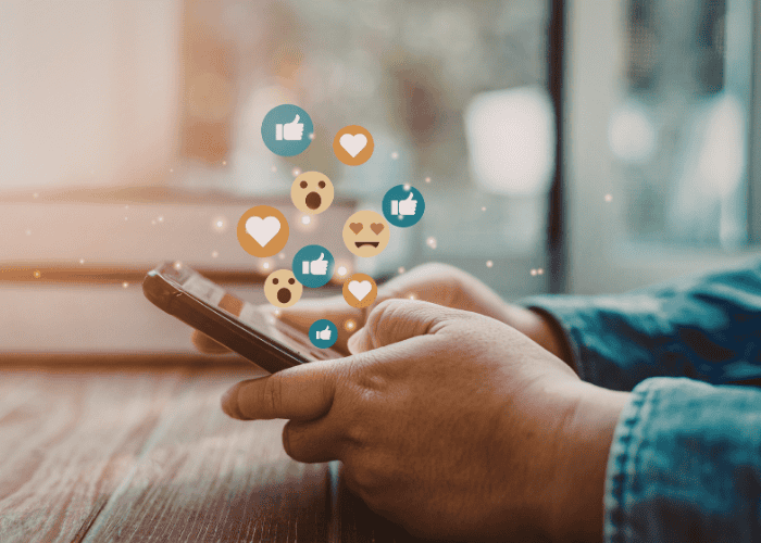 man using phone for social media needing support with managing social media algorithms’ impact on mental health