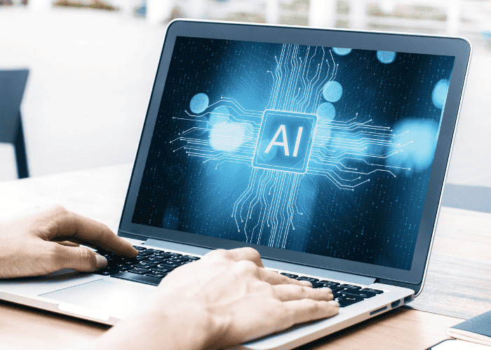 A woman using AI on laptop, wondering about regulations around how AI Is used for improving mental health