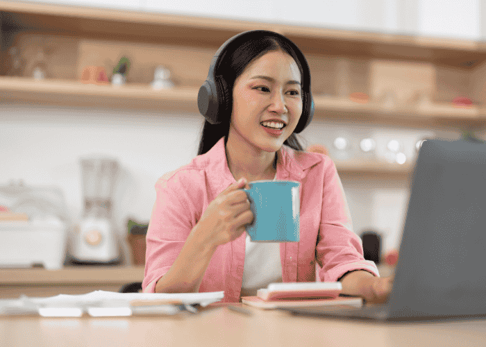 Woman happy working from home after support with post-pandemic work stress