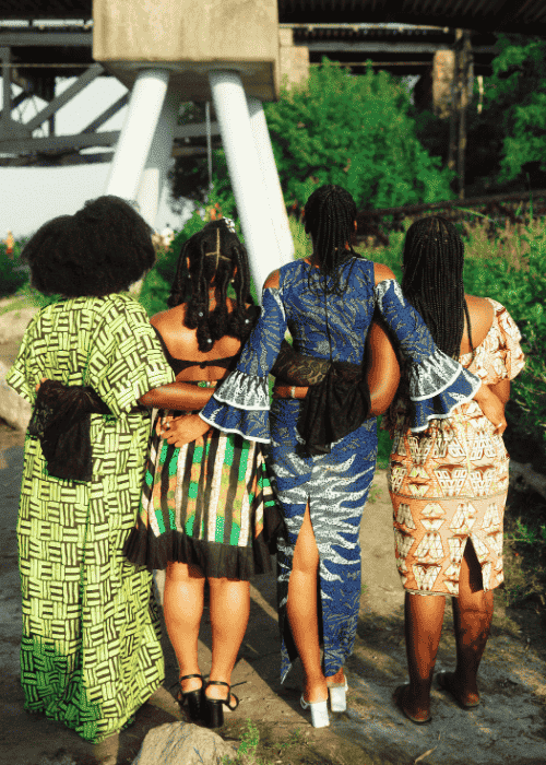 Women in colorful African dresses representing marginalized communities and mental health care