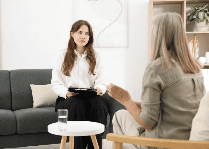 Woman accessing therapy after state level reforms in behavioral health care