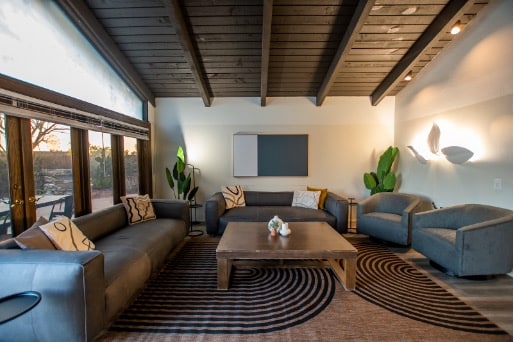 Mission Connection outpatient mental health facility with a calm, welcoming therapy room where a licensed clinician leads an individual anxiety treatment session.