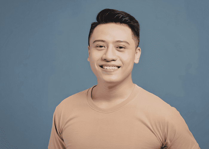 Man smiling after support with chronic stress and the brain