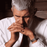 Man sitting head in hands needing support with dopamine and mood disorders
