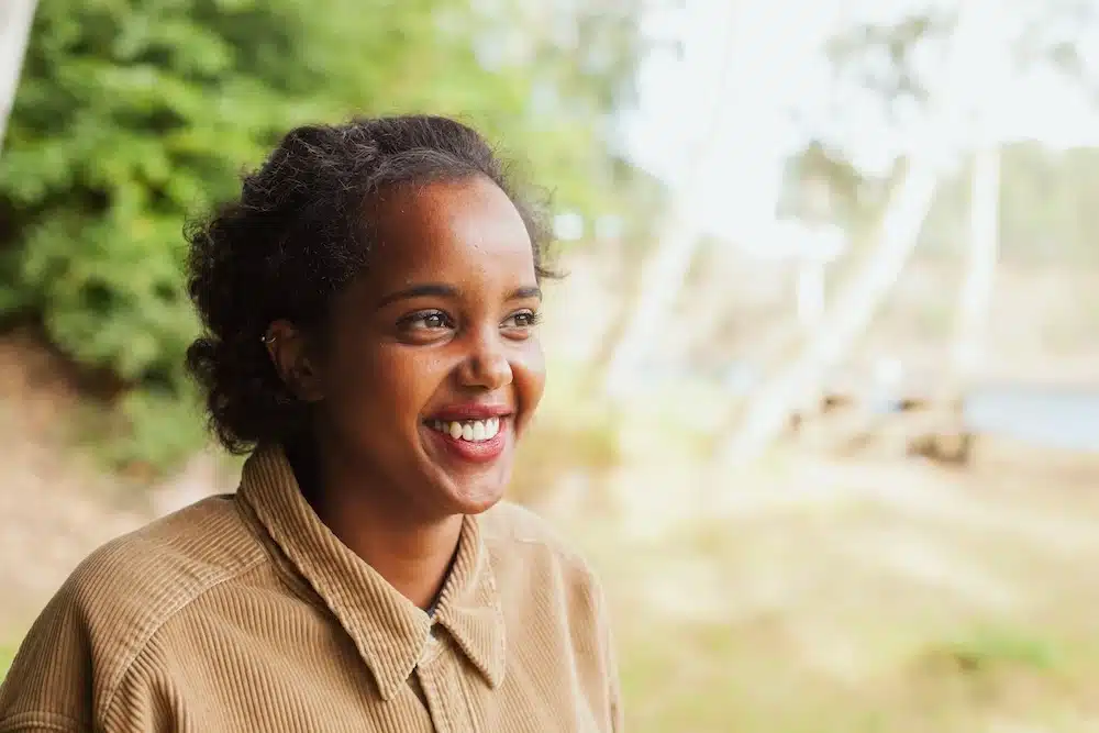 woman smiling outside