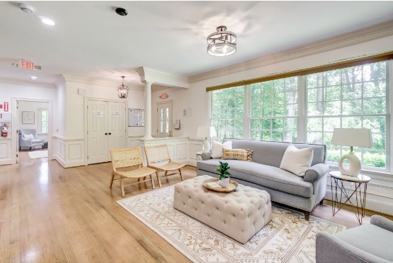 Homey living room space in one of Mission Connection’s facilities